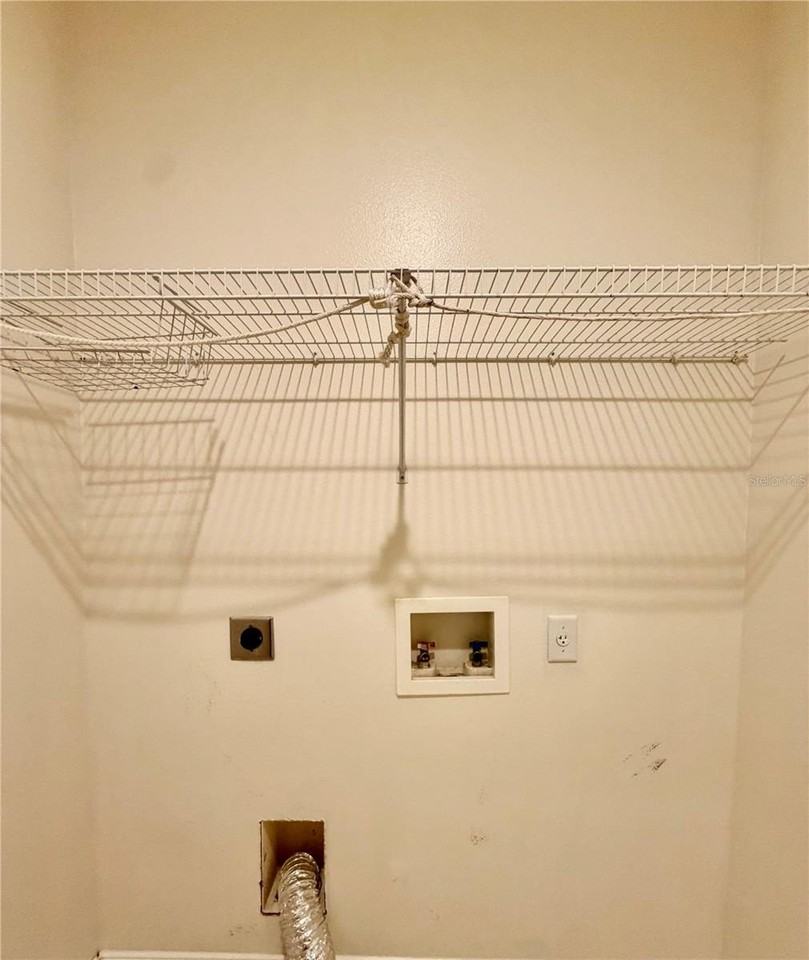 6825 S Kissimmee St - Photo 7 of 17