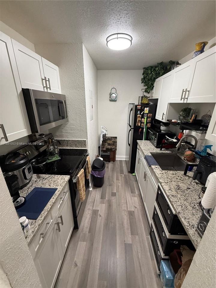 7429 Sw 152nd Ave #13-202 - Photo 3 of 8