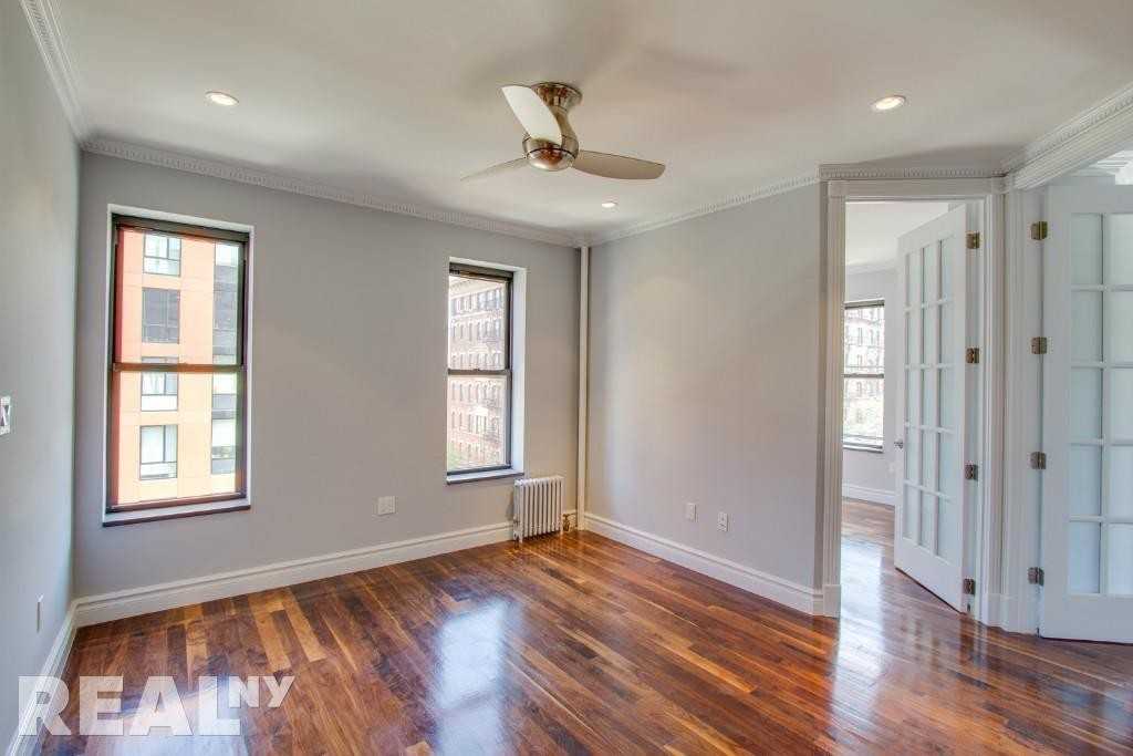 E 6th St #3 - Photo 3 of 5