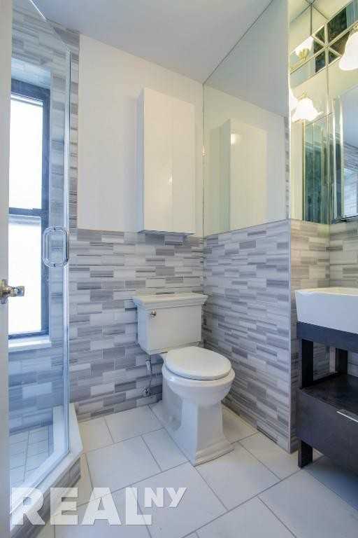 E 6th St #3 - Photo 4 of 5