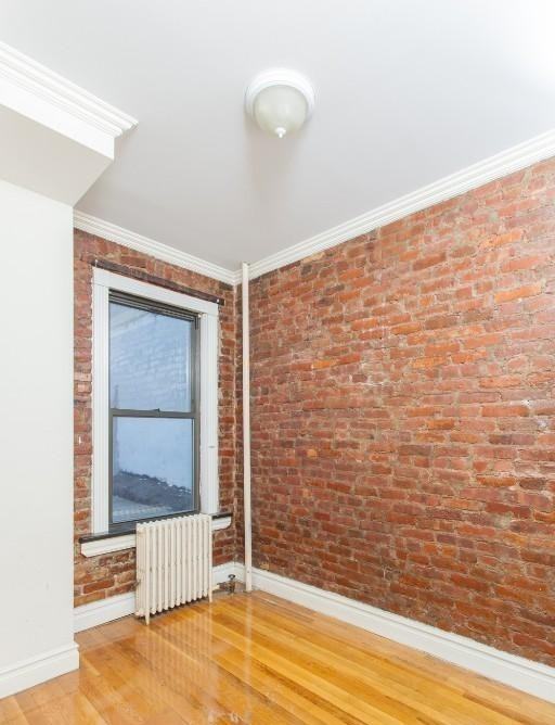 E 13th St #2D - Photo 6 of 7