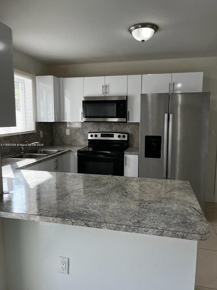 1740 Northwest 64th Street #2 - Photo 3 of 8