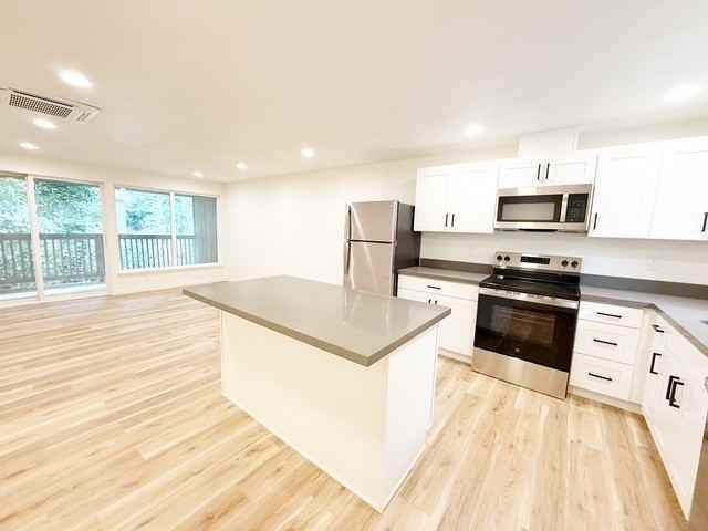 Country Squire Apartments - Photo 2 of 19