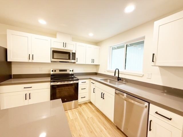 Country Squire Apartments - Photo 3 of 19