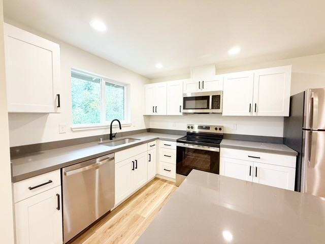 Country Squire Apartments - Photo 5 of 20