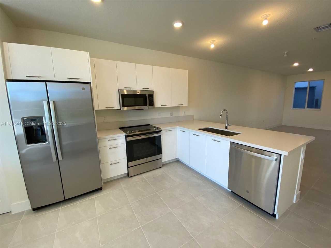 10250 Nw 66th St #103 - Photo 3 of 30