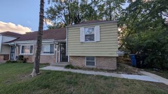 9814 S Oglesby Ave - Photo 1 of 1