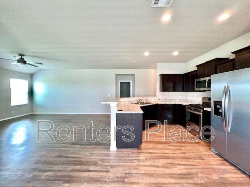 14215 N 74th East Ave - Photo 3 of 15
