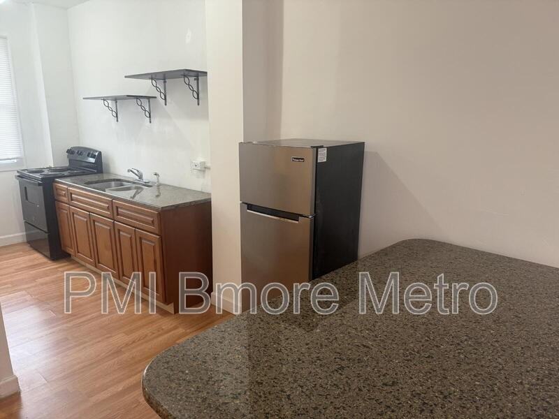 2679 Wilkens Ave - Photo 2 of 16