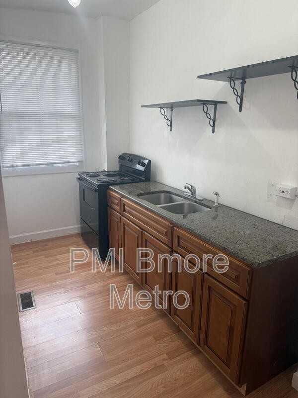 2679 Wilkens Ave - Photo 3 of 16