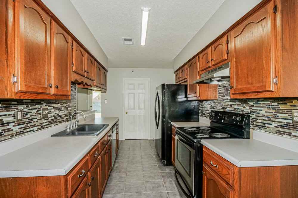 6935 Amanda Dr N - Photo 7 of 16