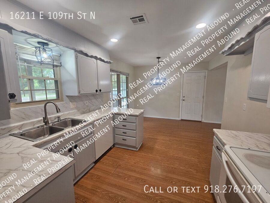 16211 E 109th St N - Photo 3 of 31