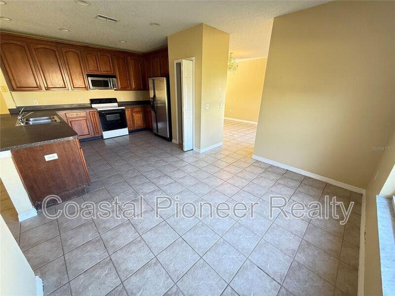 4554 Ficus Tree Rd - Photo 2 of 27