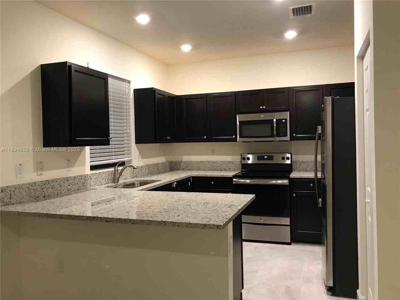 10390 West 33rd Lane #10390 - Photo 2 of 17