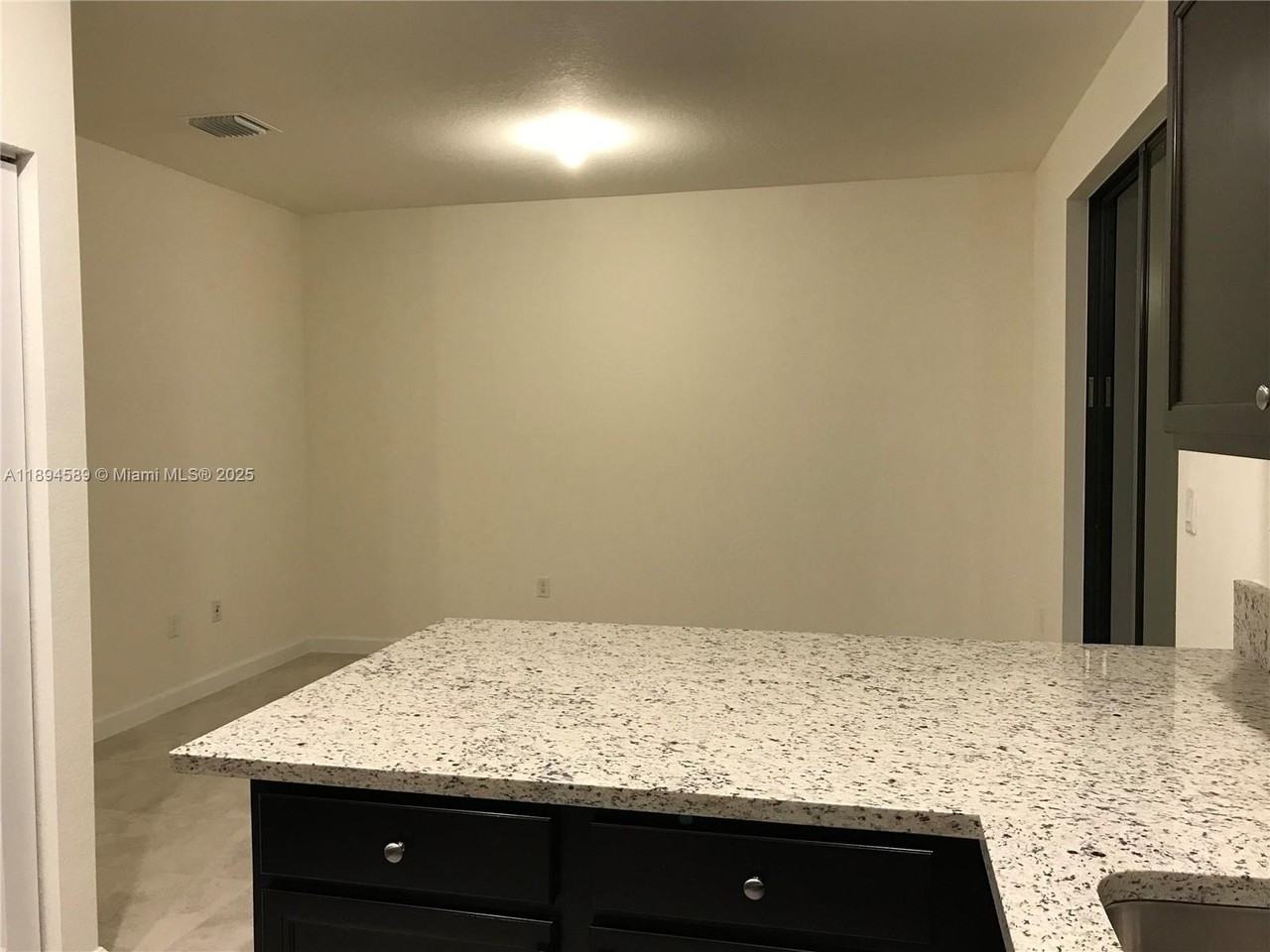 10390 West 33rd Lane #10390 - Photo 3 of 17