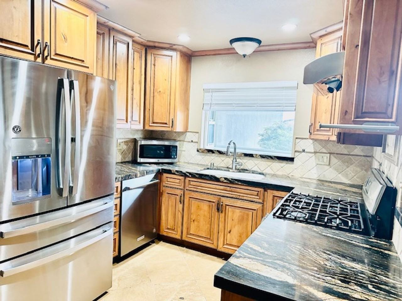 1960 Geneva St - Photo 2 of 15