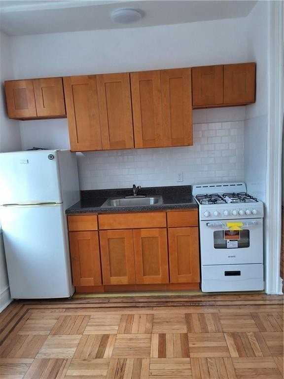 12010 Rockaway Beach Blvd #105 - Photo 2 of 7