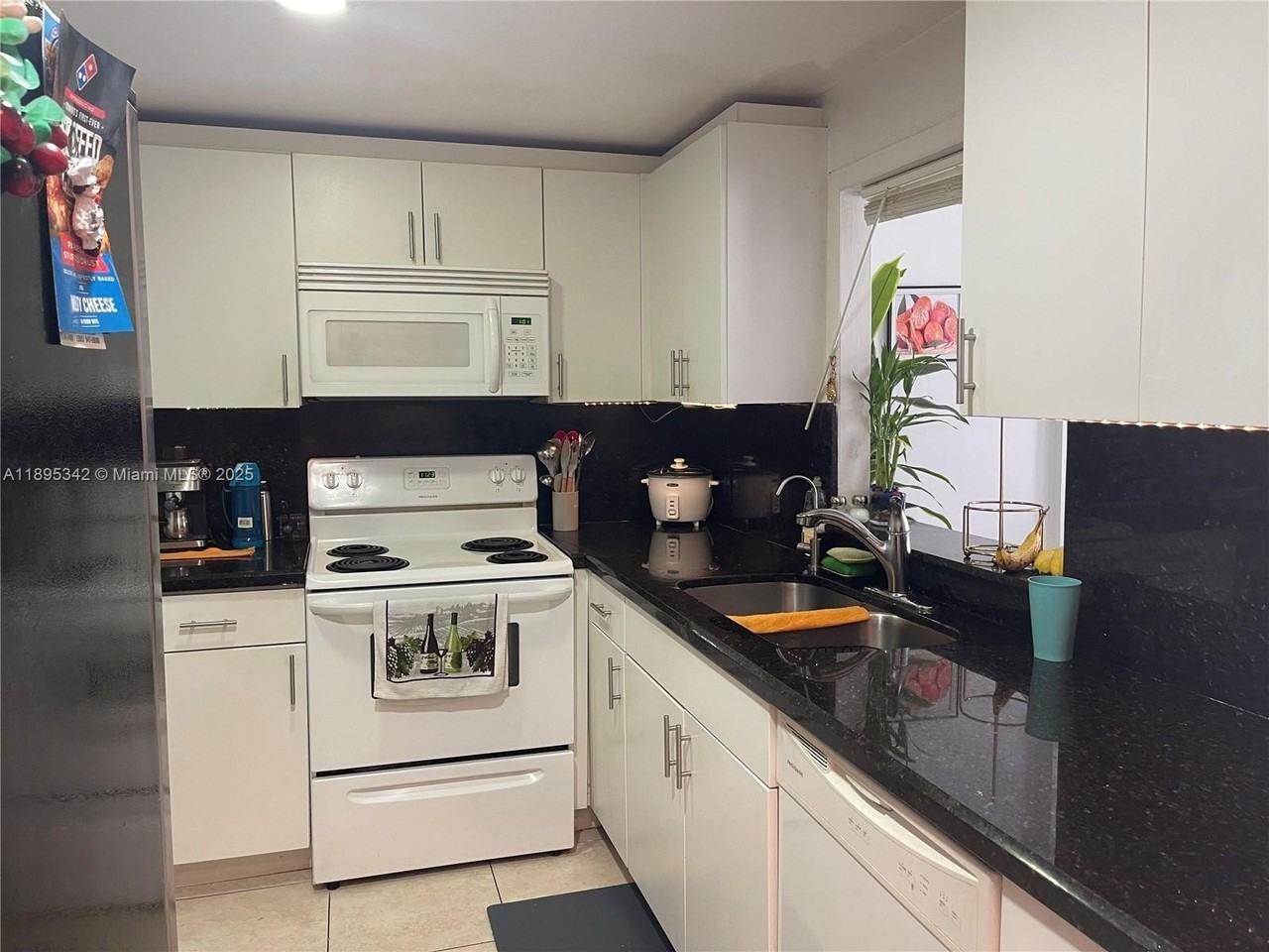 3750 Ne 169th St #102 - Photo 5 of 7