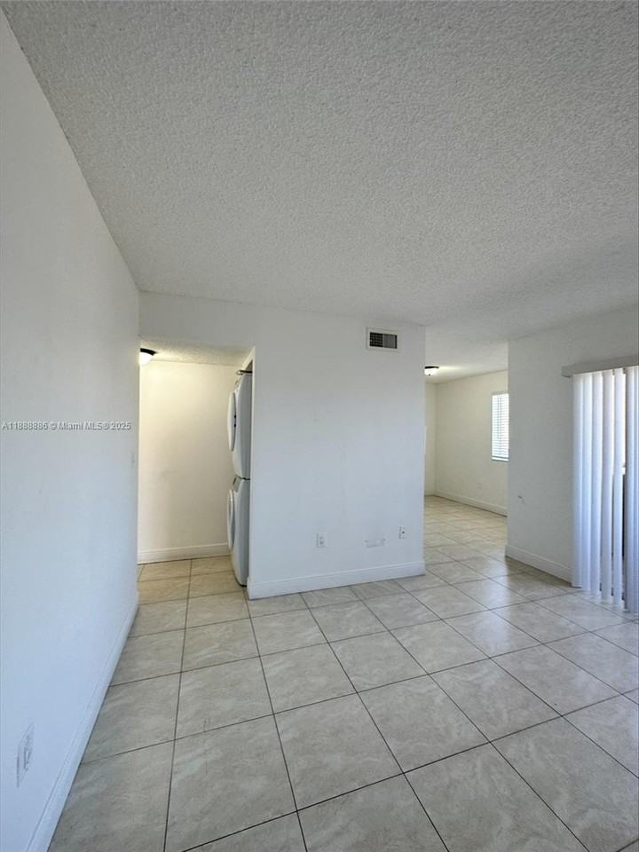 6214 Southwest 131st Court #201 - Photo 2 of 8