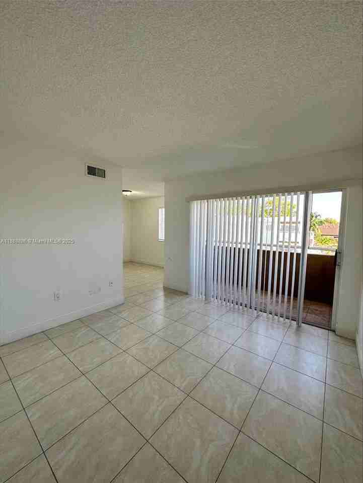 6214 Southwest 131st Court #201 - Photo 3 of 8