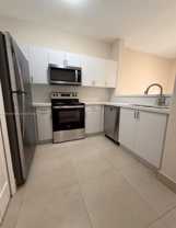 1661 Se 29th Ct #103 - Photo 1 of 1