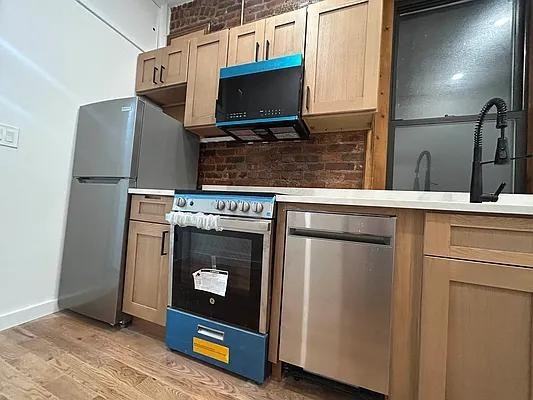 E 2nd St #13 - Photo 2 of 20