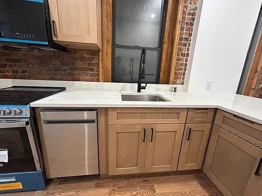 E 2nd St #13 - Photo 3 of 20