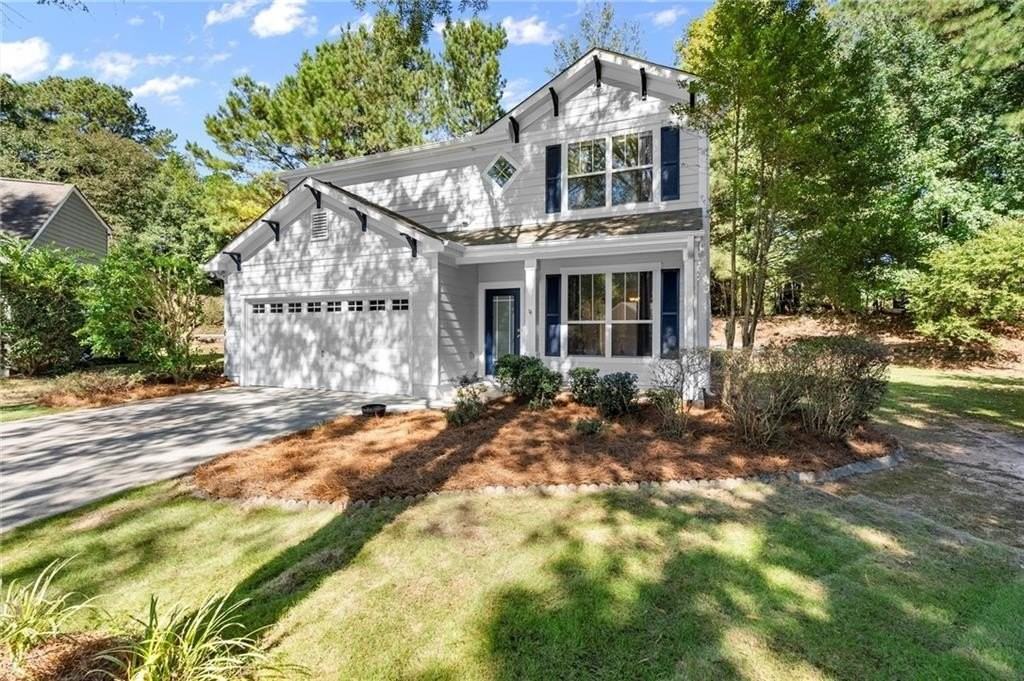 3916 Wild Blossom Ct Nw - Photo 2 of 50