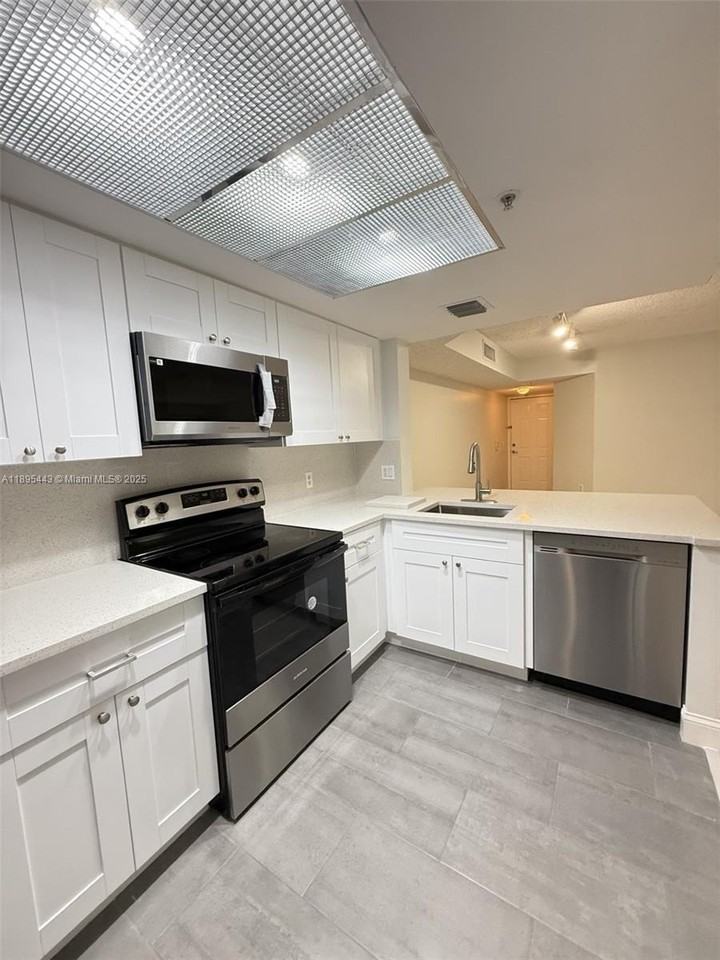 5015 Wiles Rd #205 - Photo 3 of 15