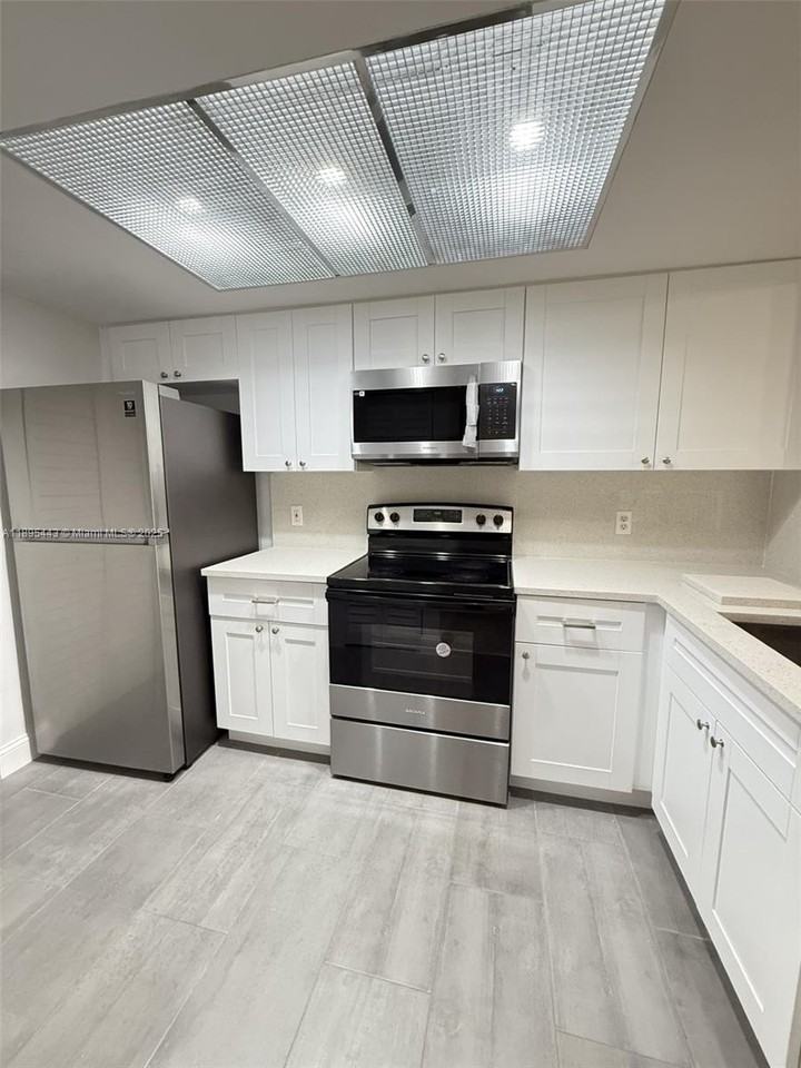 5015 Wiles Rd #205 - Photo 4 of 15