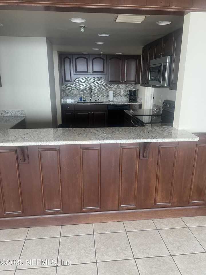 1513 Ocean Shore Blvd Apt B4 #4B - Photo 2 of 50