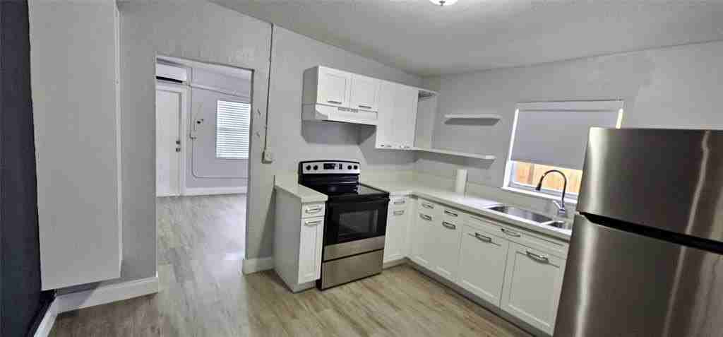 750 Northwest 17th Terrace #1 - Photo 3 of 14