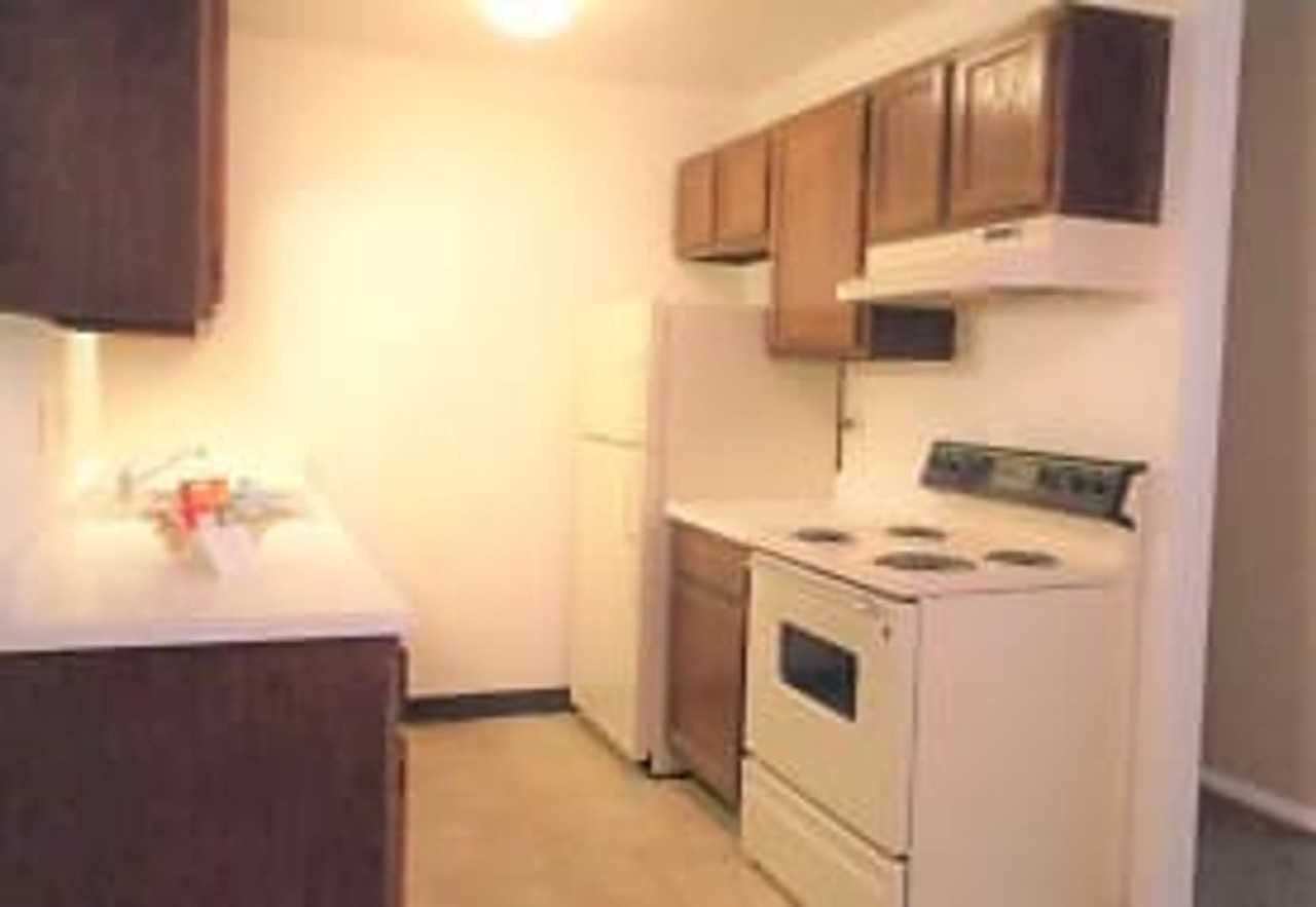Monroe Village Apartments - Photo 3 of 9