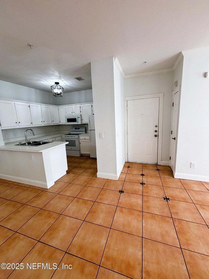 201 Colima Court #1211 - Photo 2 of 35