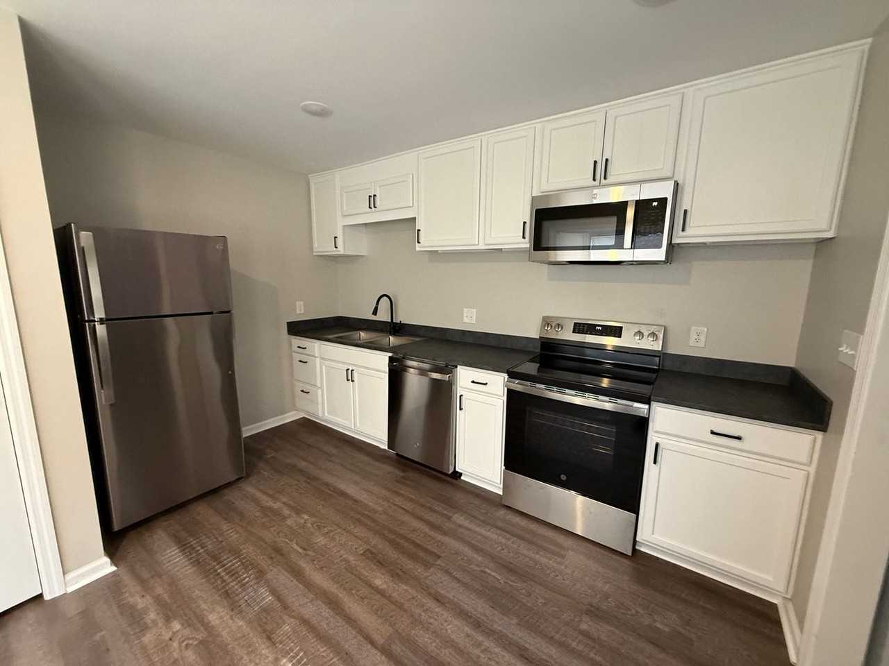 3323 Christopher Dr Nw Apt D - Photo 3 of 11