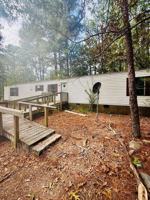 featured image of 128 Ed Thomas Rd