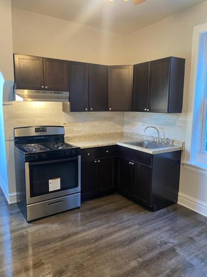 3245 W. 23rd - Photo 2 of 18