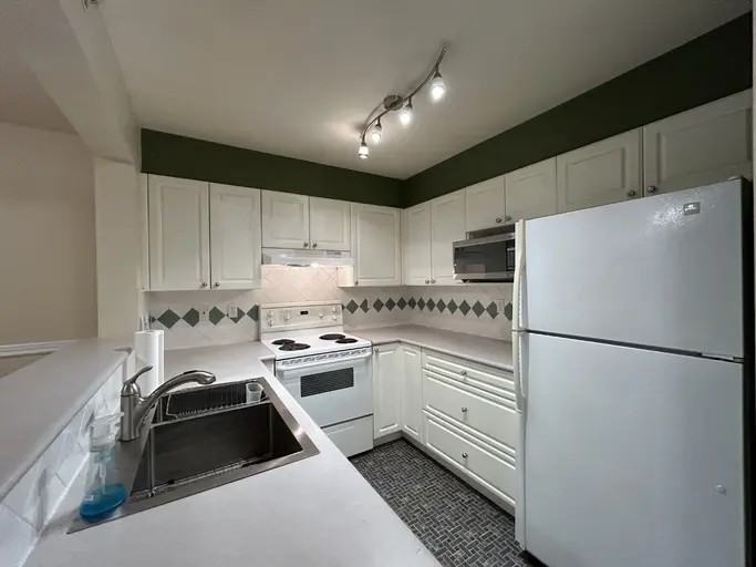 5518 14 Avenue #101 - Photo 2 of 16