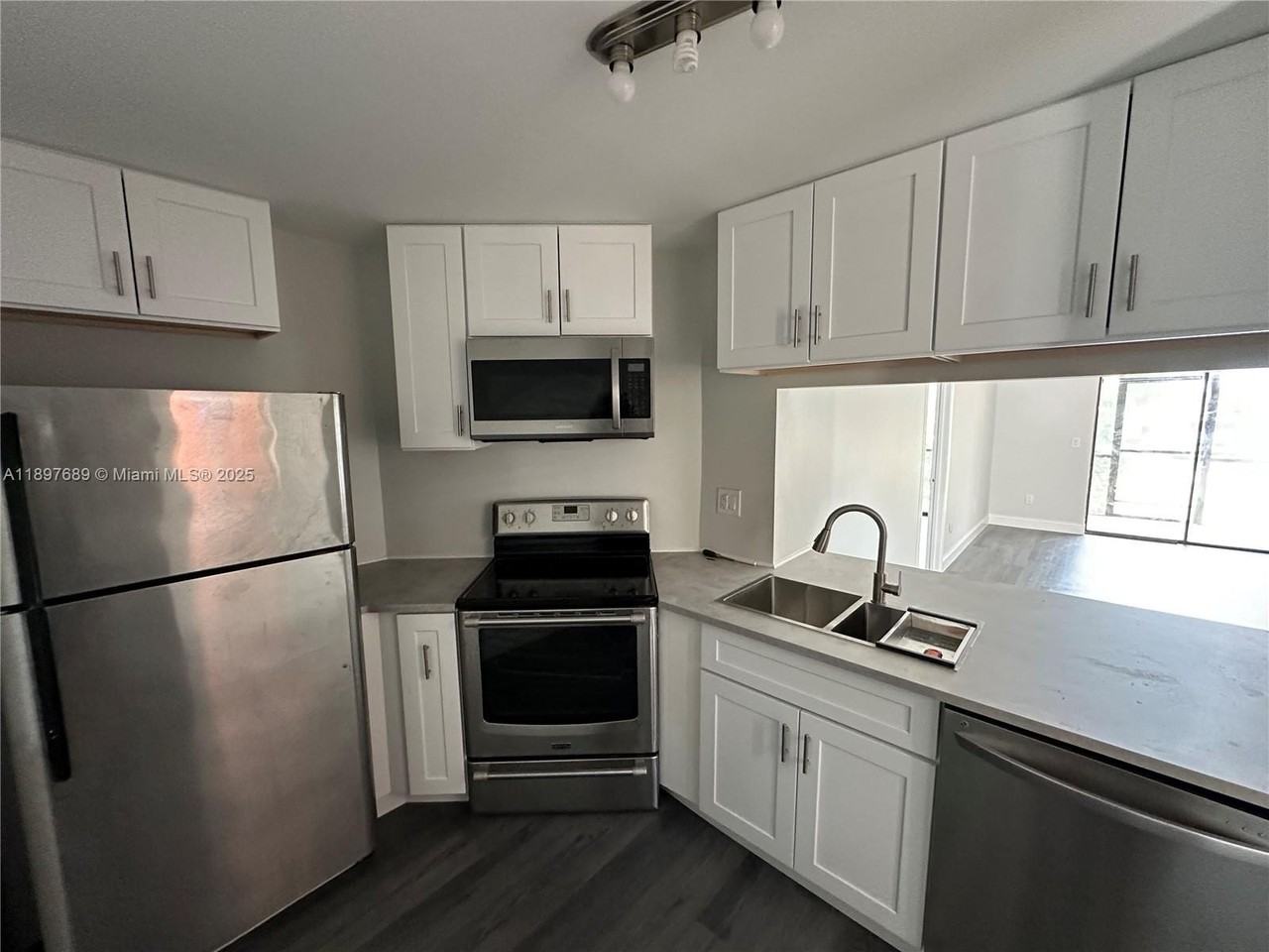 855 Northeast 209th Street #103-34 - Photo 3 of 38