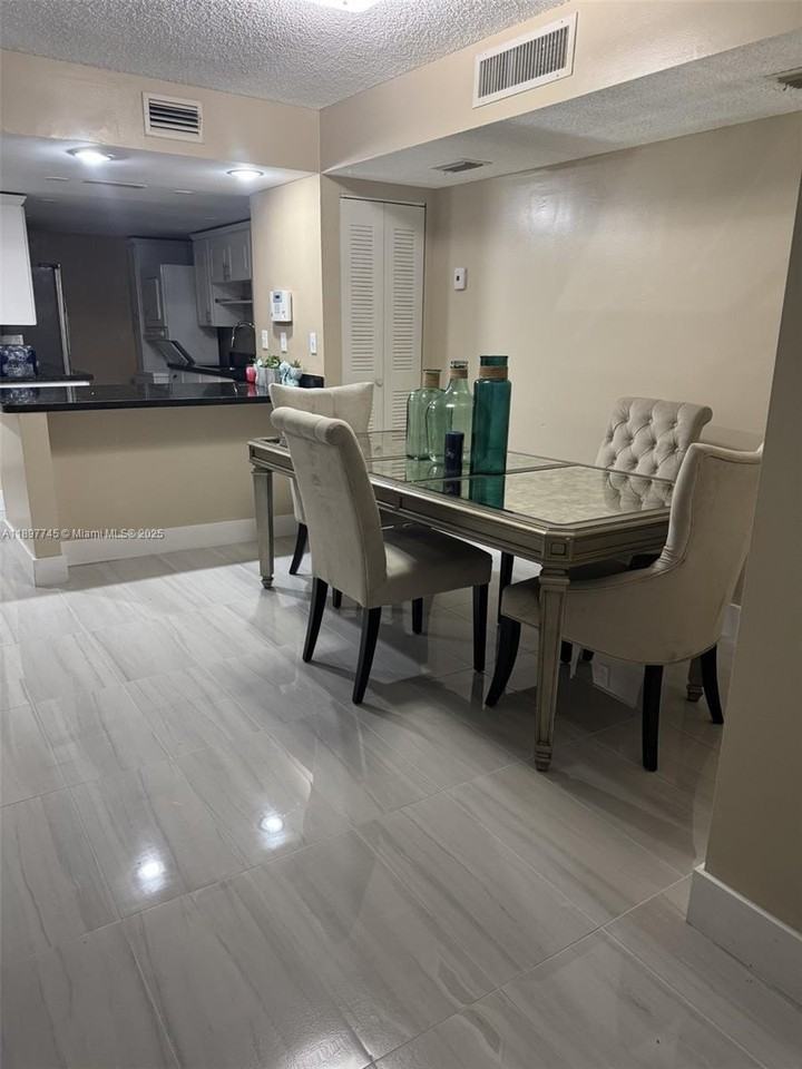 827 Ne 199th St #102 - Photo 2 of 6