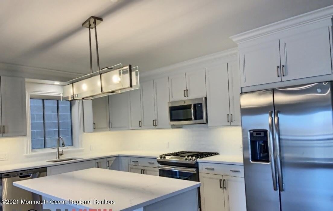 5761 Brighton Ave Unit 301 #301 - Photo 7 of 50