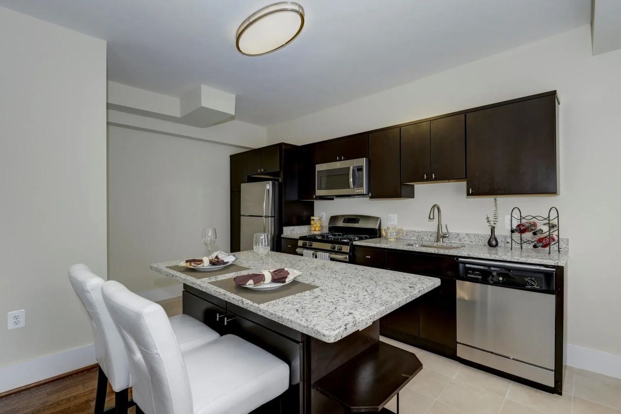 NEW QUIN APARTMENTS - Photo 3 of 12