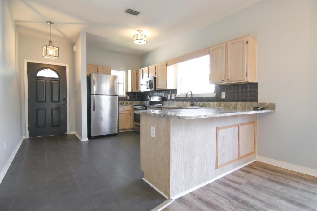 7943 Audubon Drive - Photo 3 of 50