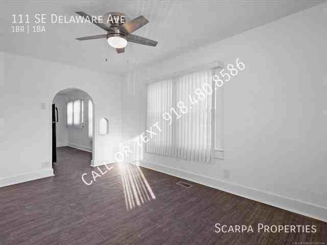 111 Se Delaware Ave - Photo 5 of 19