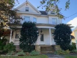 featured image of 34 W 8th St