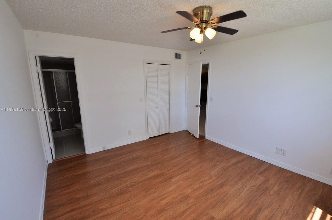 9949 Sandalfoot Boulevard #521 - Photo 2 of 7