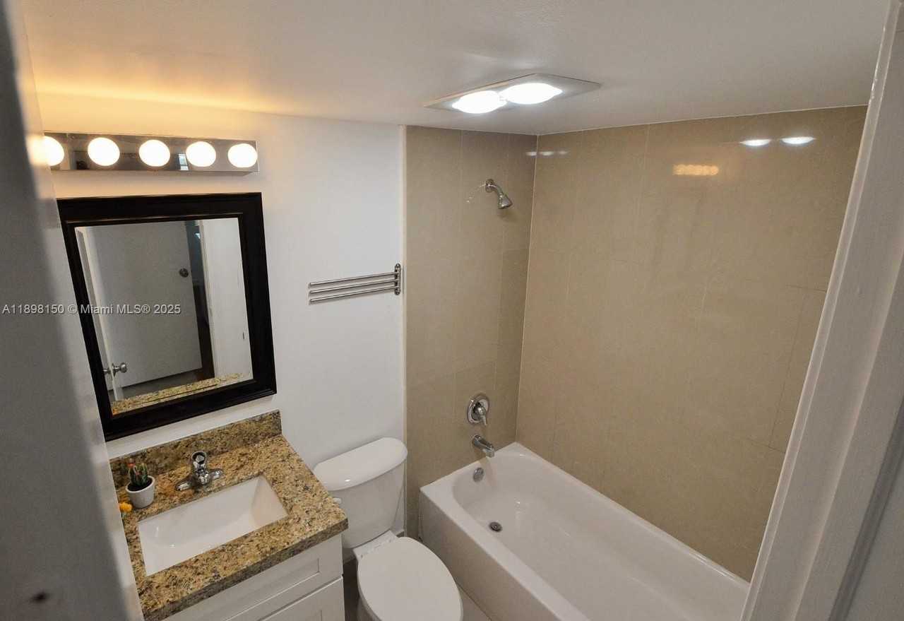 9949 Sandalfoot Boulevard #521 - Photo 5 of 7