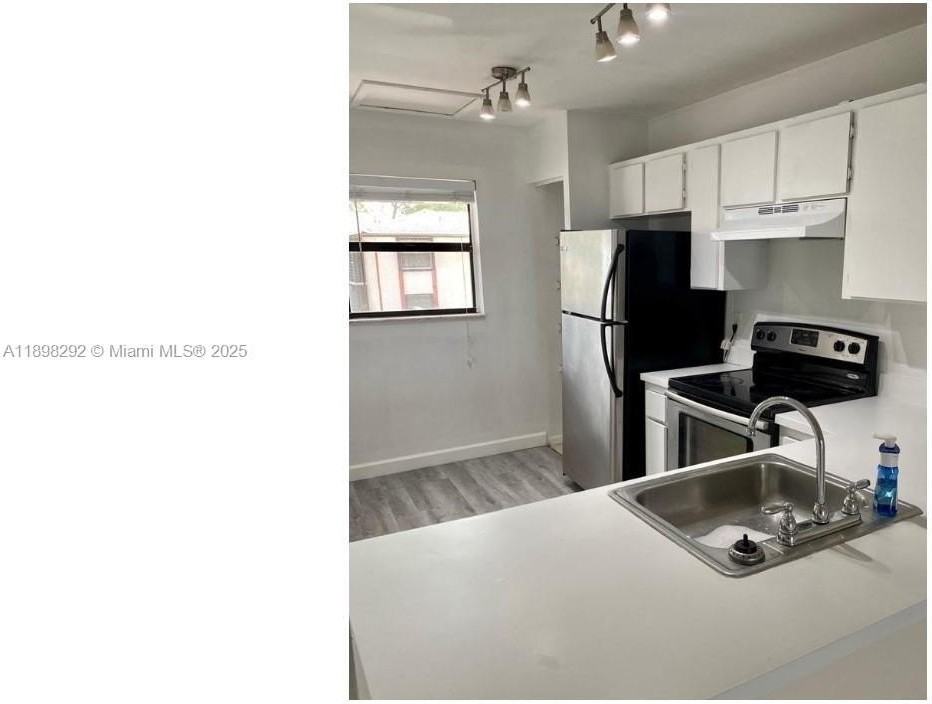 911 Northeast 209th Terrace #202 - Photo 7 of 16