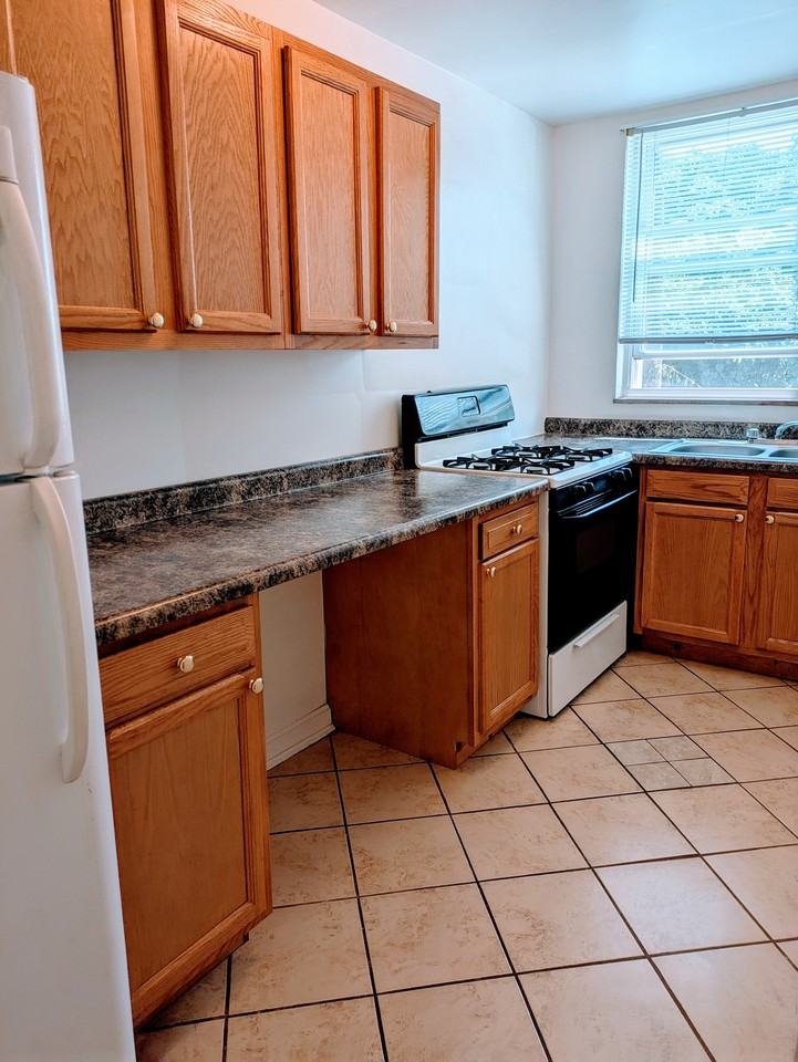 Belmont Apartments 5936 Belmont Ave - Photo 4 of 29