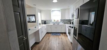 featured image of Arlington Ave E